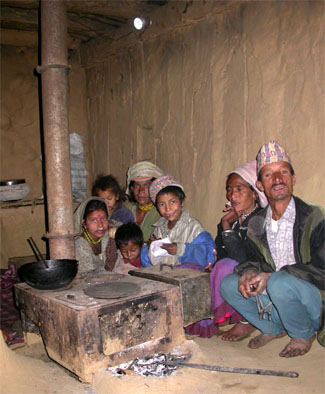Family with an Electric Light Bulb in rural Nepal. (Alex Zahnd)